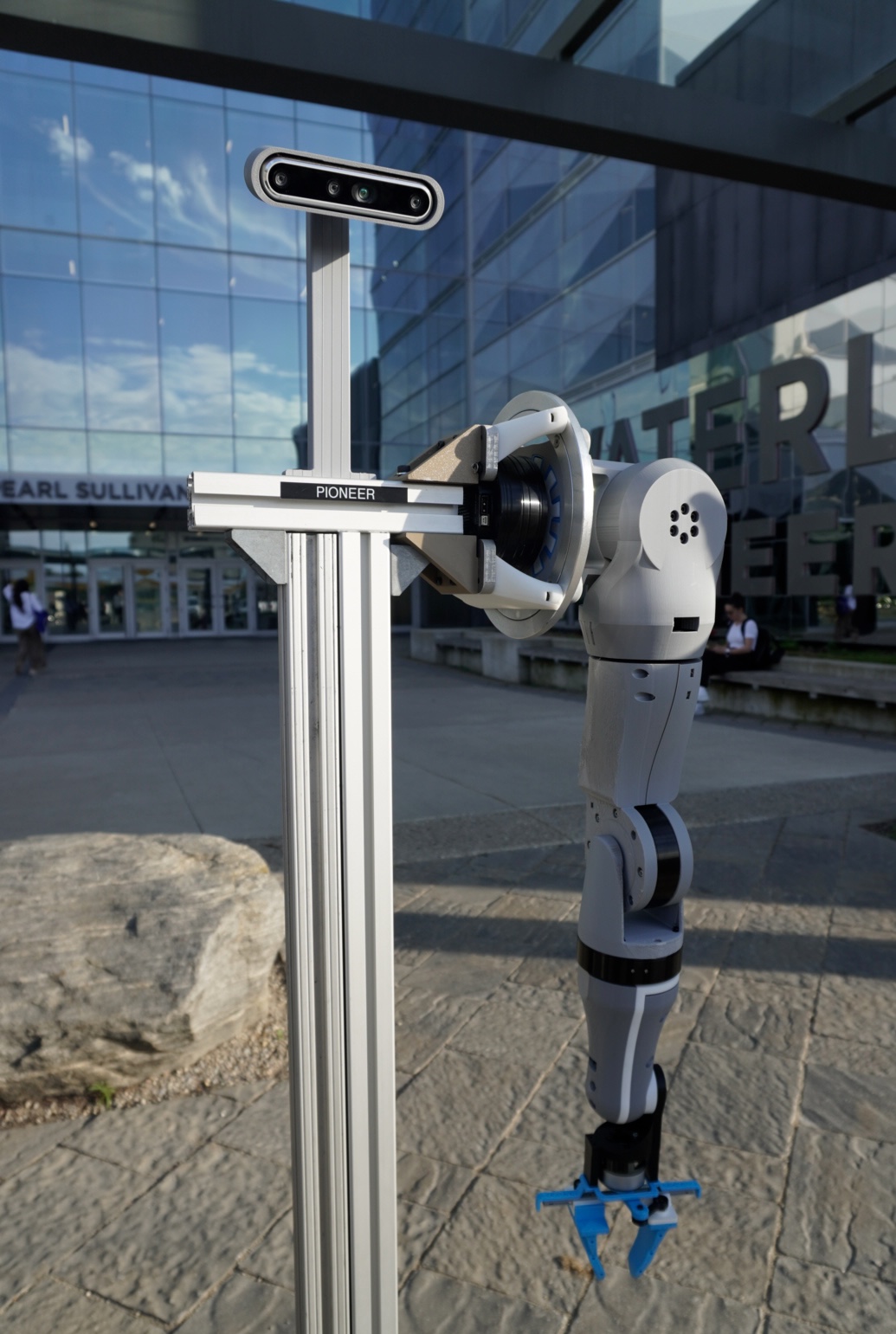 Pioneer robot arm on its stand outside Waterloo Engineering